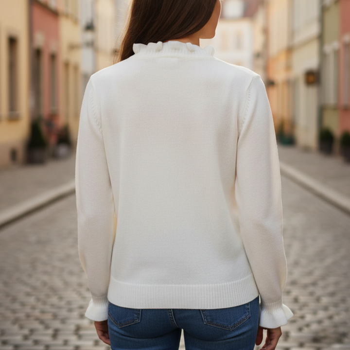 Maglione bianco da donna con volant e perle