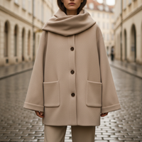 Short Women's Coat Made of High-Quality Material with Hood and Oversized Cape