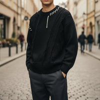Oversized sweater til mænd med slidte detaljer