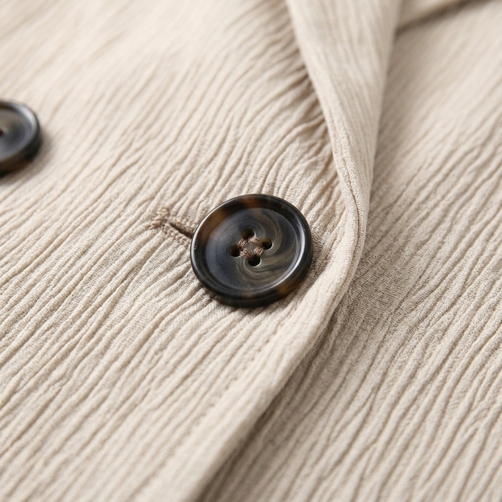 Completo da donna con blazer doppiopetto e pantaloni a gamba larga