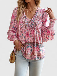 Blusa boho da donna con stampa floreale, scollo a V e maniche a sbuffo